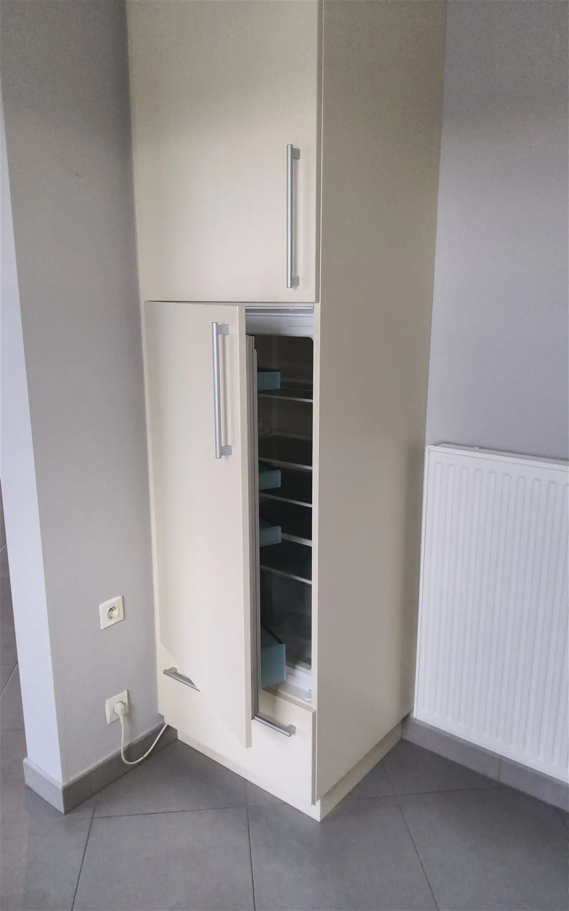 Ruim 2 slaapkamer-appartement met garage foto 14