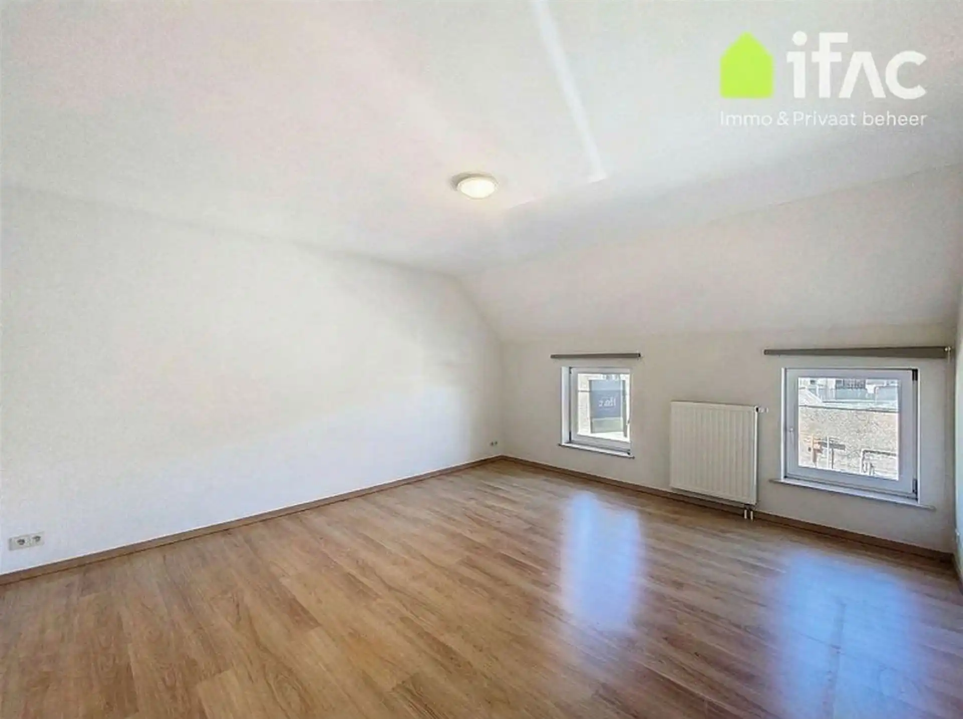 Gezellige rijwoning met 2 slaapkamers en terras foto 13