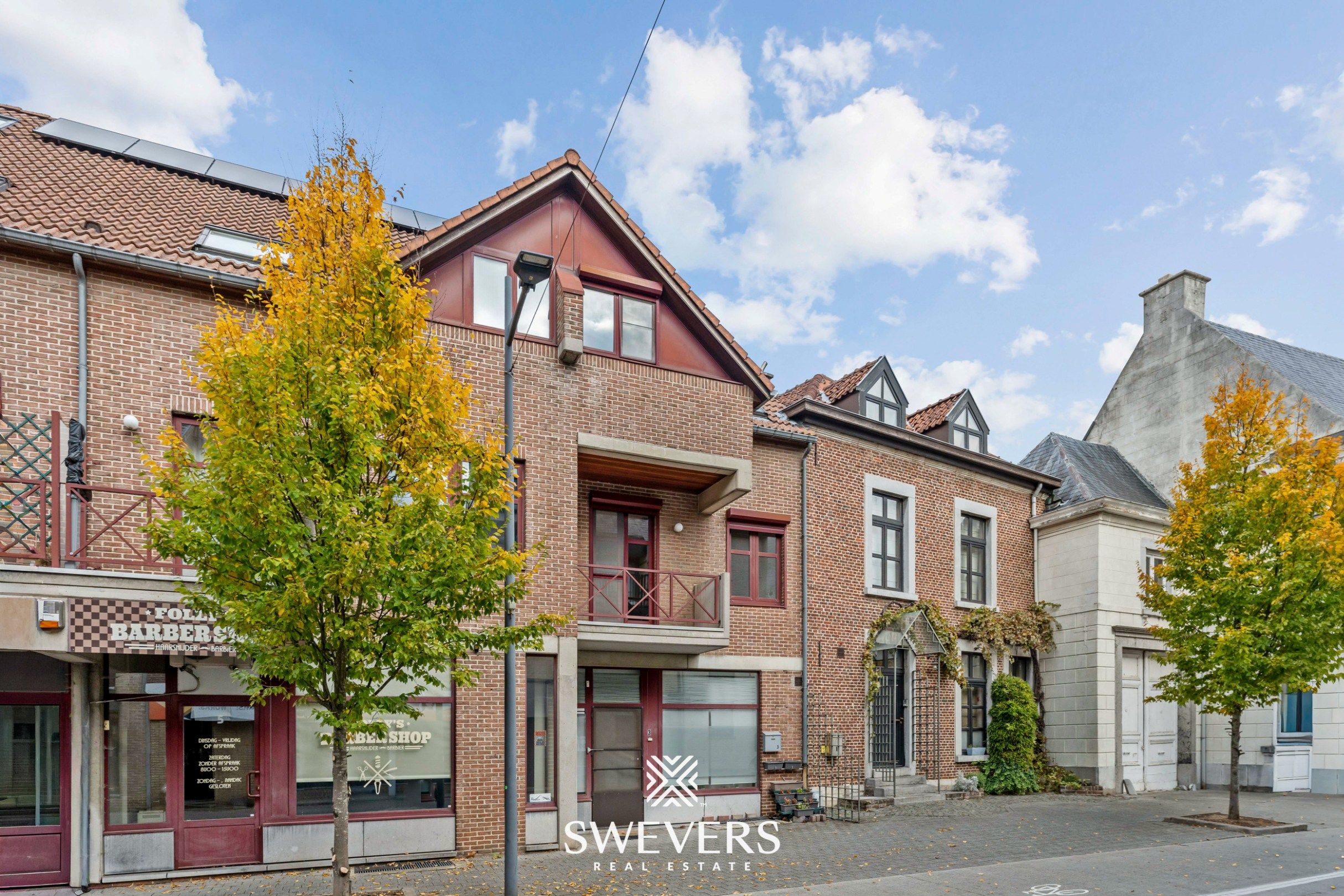 Instapklaar en lichtrijk duplexappartement in centrum Herk-de-Stad foto 31