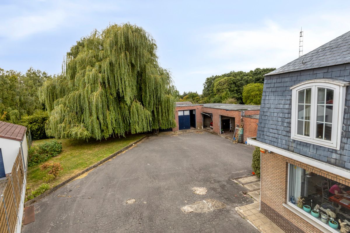 Landelijke woning met 2 loodsen foto 18