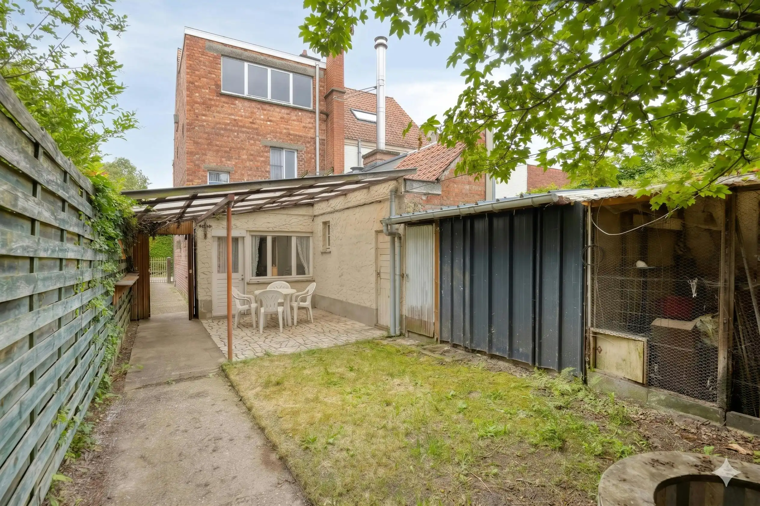 Te renoveren woning met 3 slaapkamers en zolder in centrum Sint-Martens-Latem foto 3