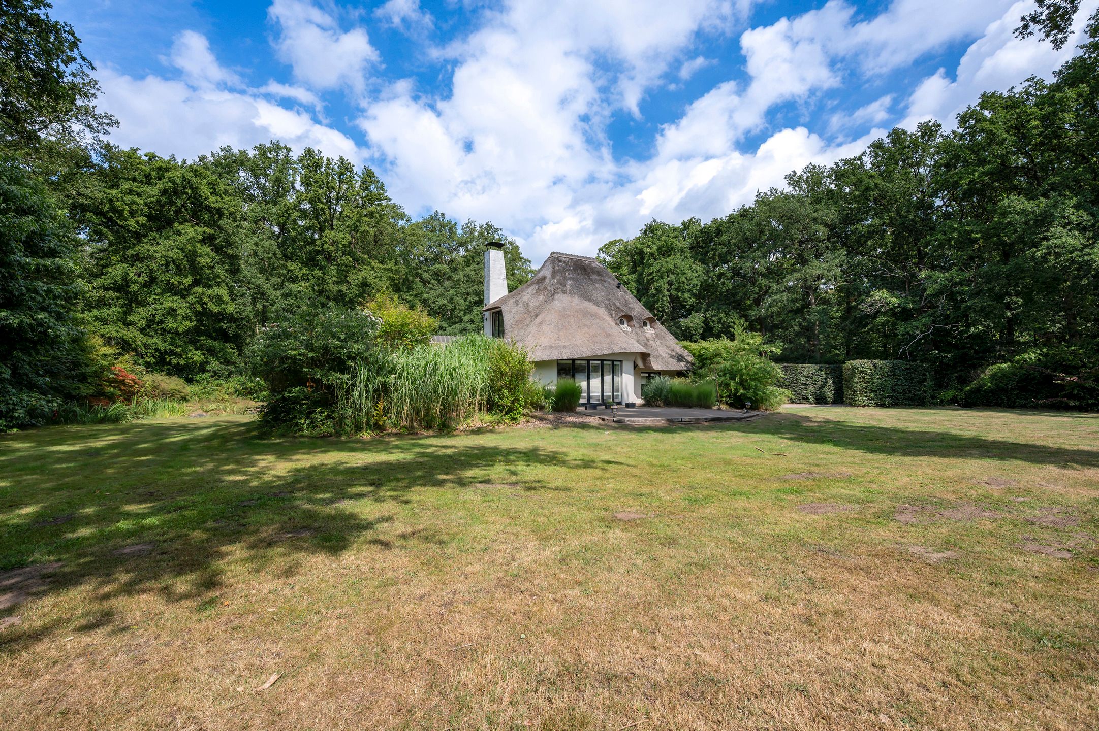 Charmante rietgedekte villa foto 39