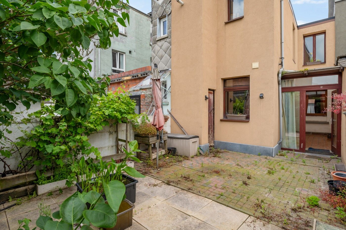 Op te frissen woning met 2 à 3 slpk. en gezellige stadstuin foto 23