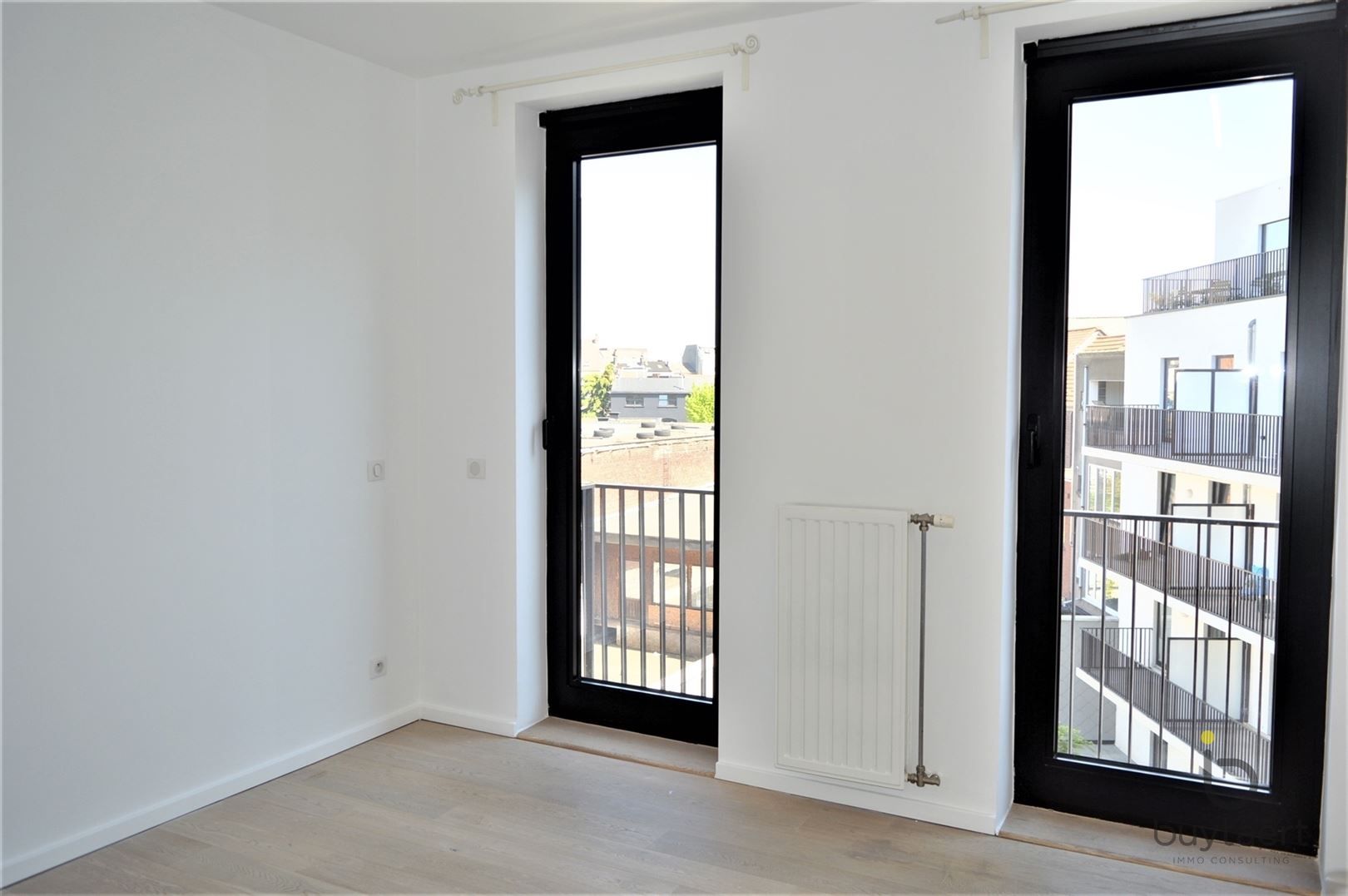 MODERN APPARTEMENT MET 2 SLPKS EN RUIM TERRAS NABIJ HET "ZUID" foto 8