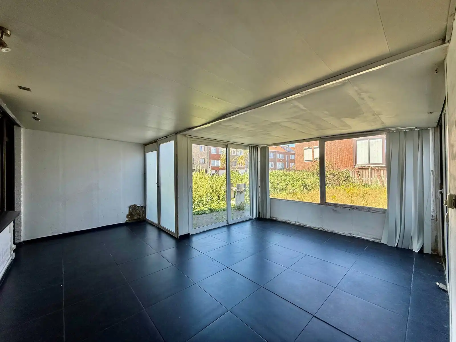 Te renoveren studio met ruime zuidwesttuin foto 6