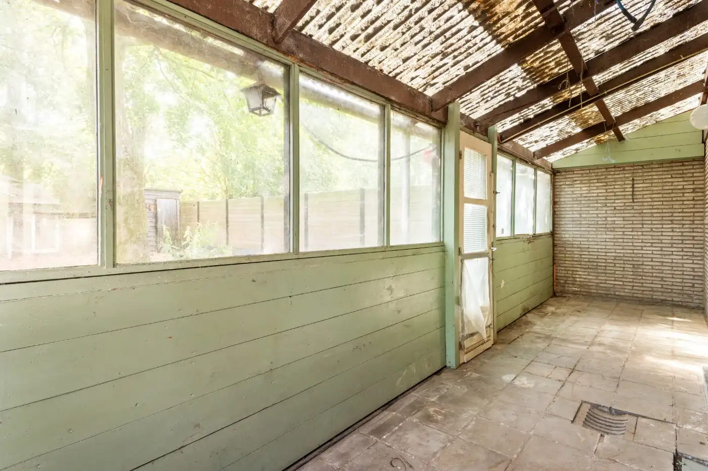 Te renoveren woning met 3 slpk., garage en tuin foto 9