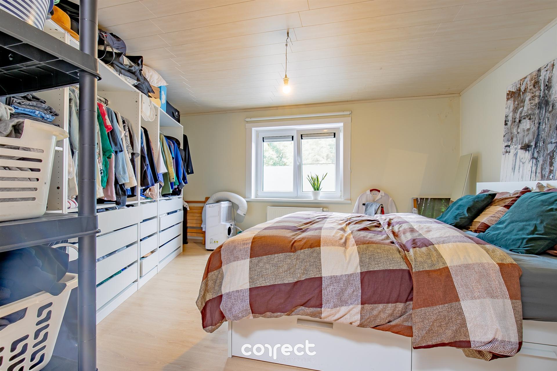 Instapklare woning met 2 slaapkamers, zonnige tuin en garage.  foto 6