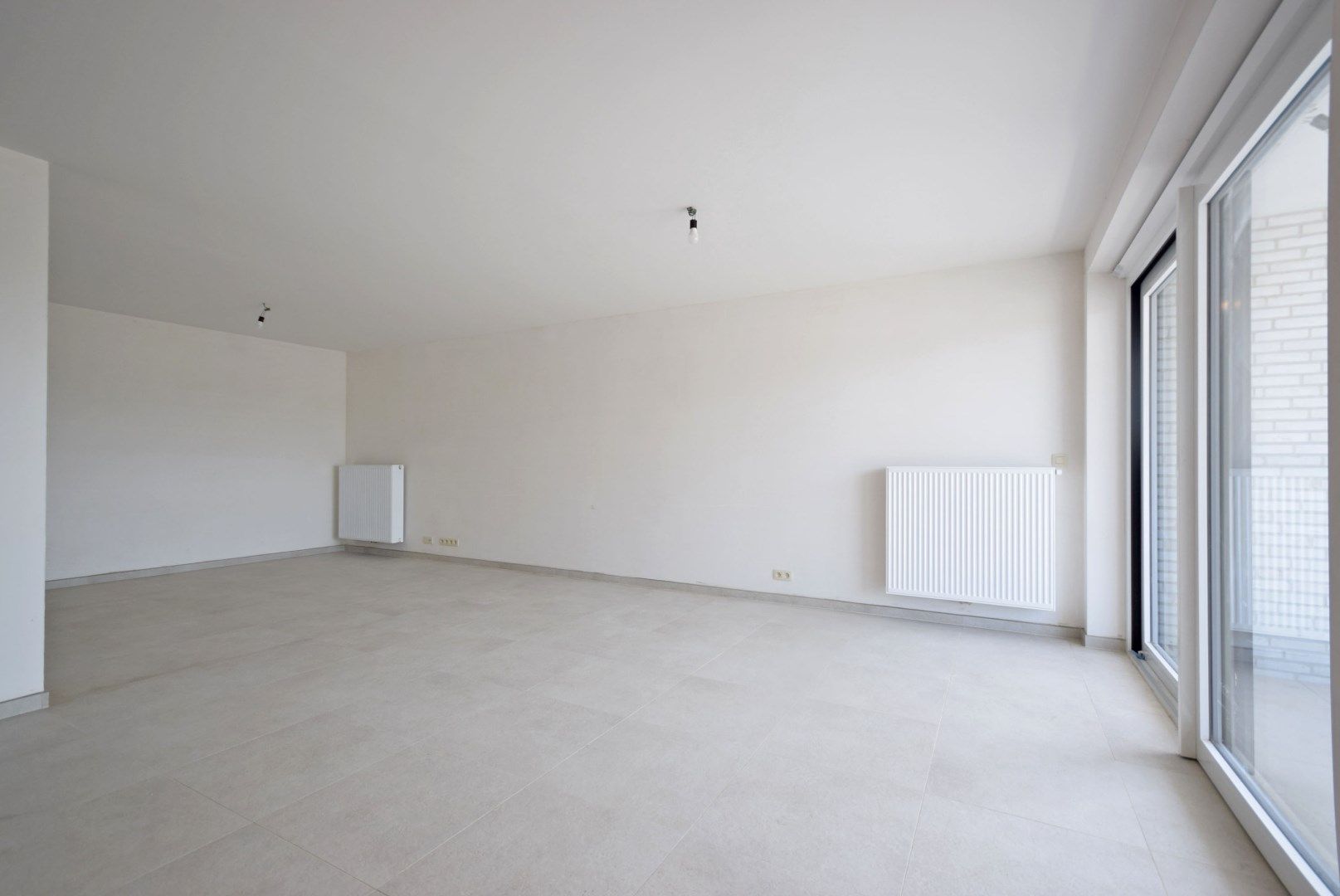 NIEUWBOUWAPPARTEMENT MET TWEE SLAAPKAMERS EN TERRAS foto 2