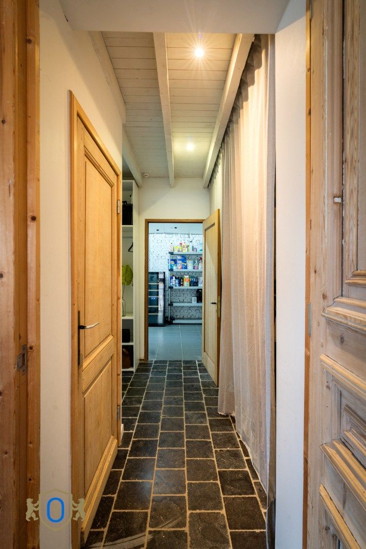 Halfopen 3-slpkr woning met tuin & carport foto 16