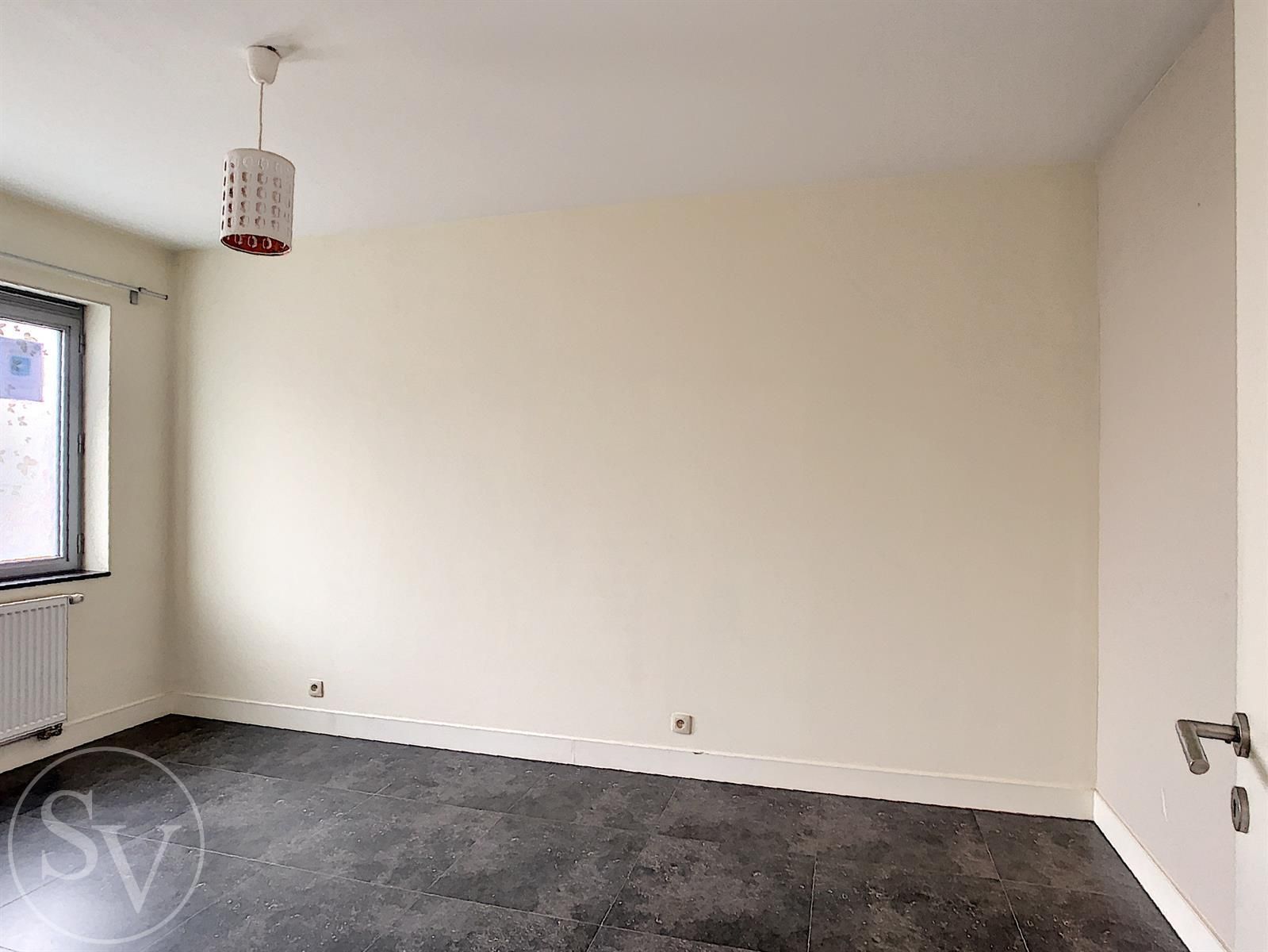 Gelijkvloers appartement, 2 slpk en tuin! foto 9