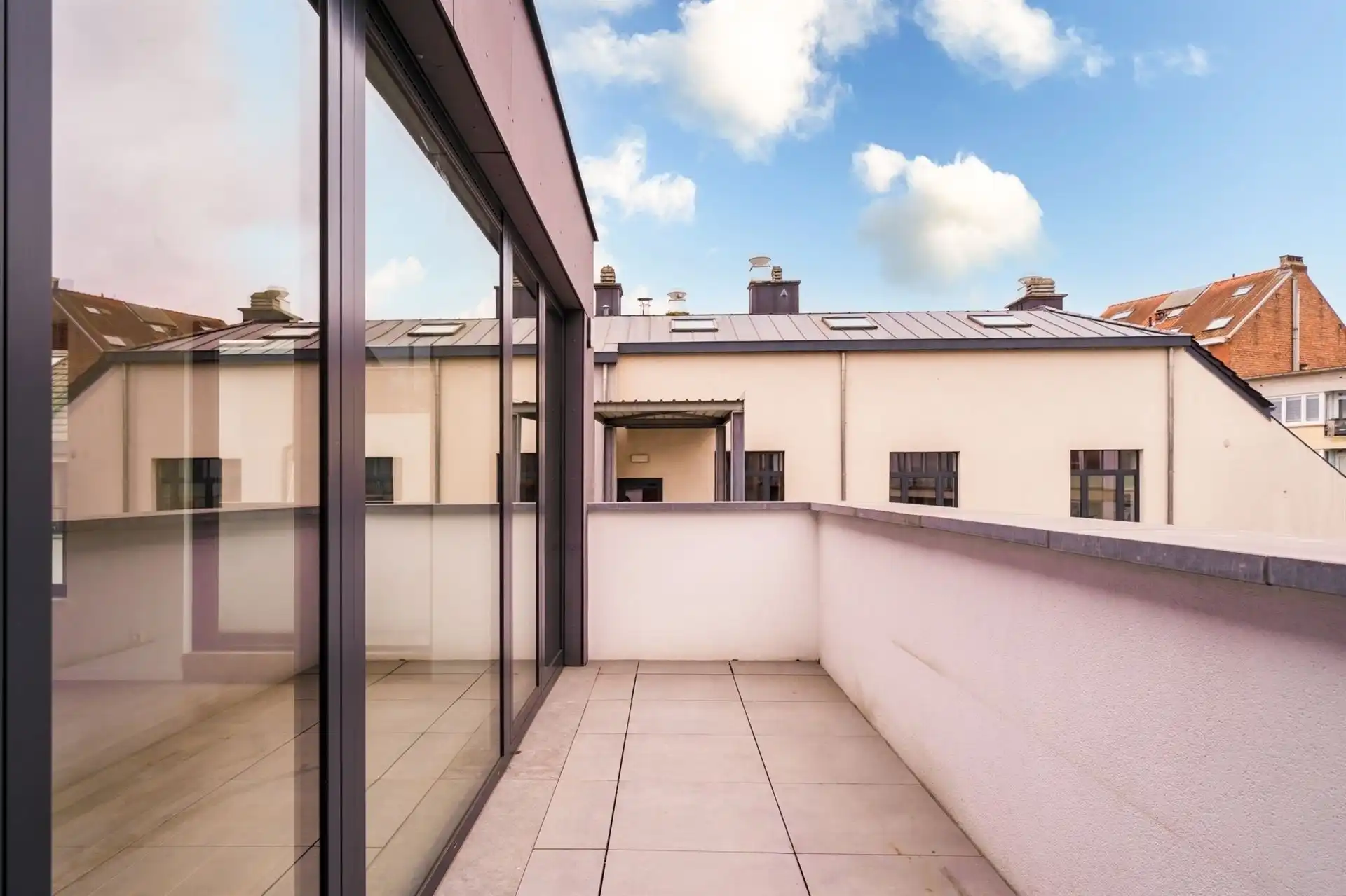 Dicht bij het Tour&Taxis-terrein, prachtig duplex penthouse met 3 slaapkamers foto 4