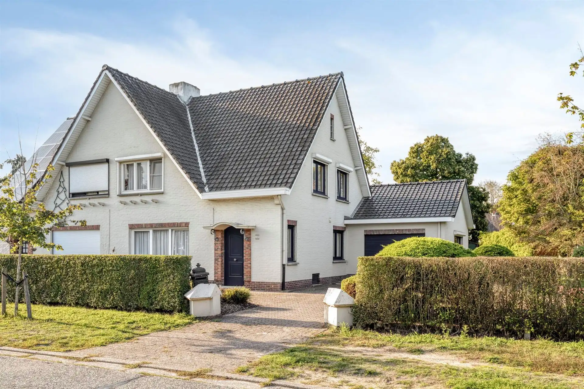 Karaktervolle woning met 3 slpk's, ruime tuin en garage! foto 2