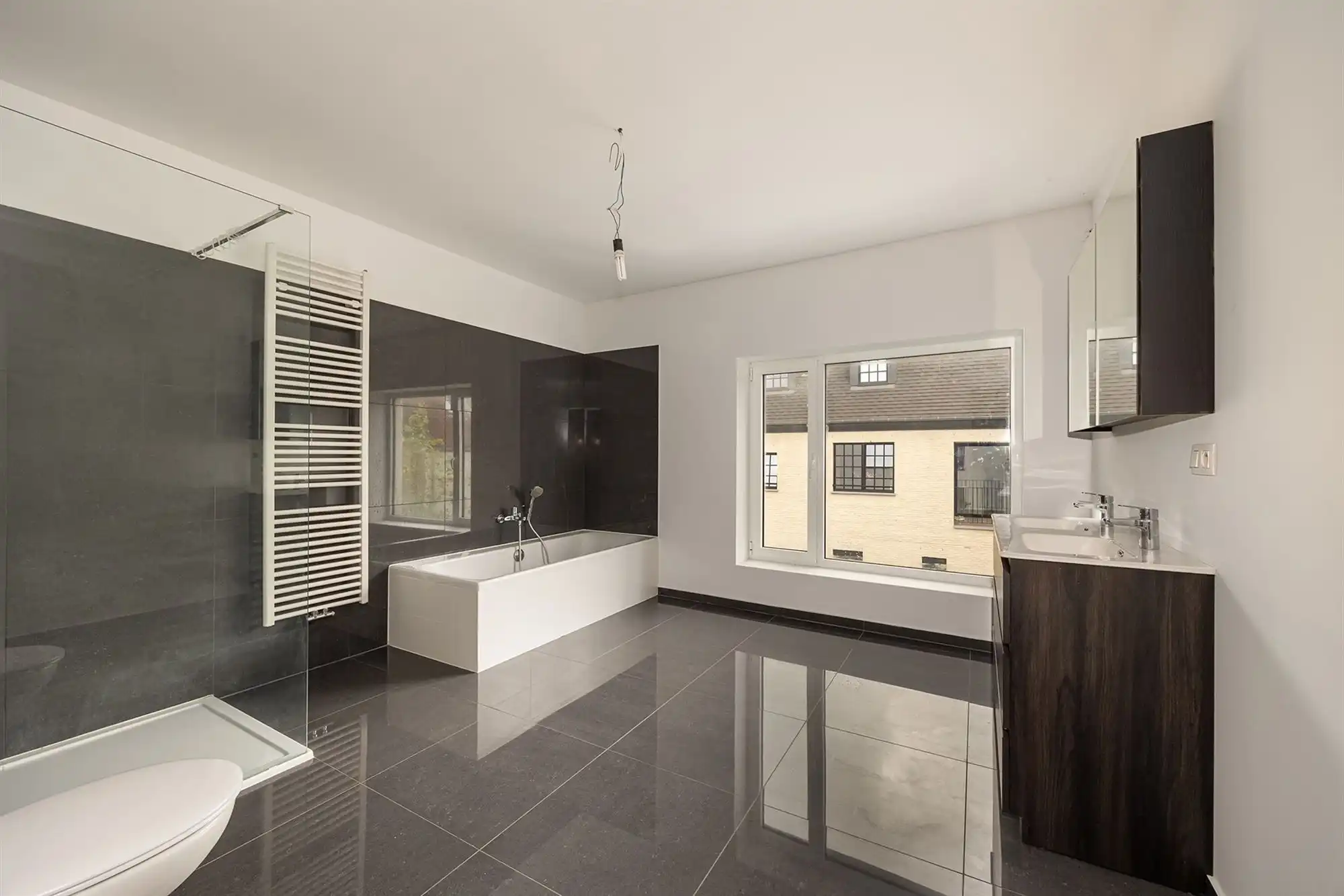 Ruime, energiezuinige woning met tuin in Rumst foto 11
