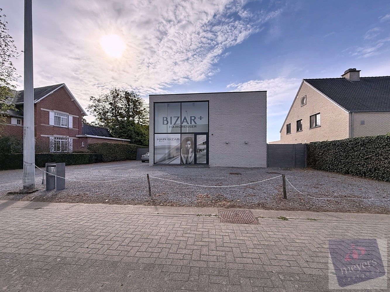 Handelspand met woonst op toplocatie in Spalbeek (Hasselt) foto {{pictureIndex}}