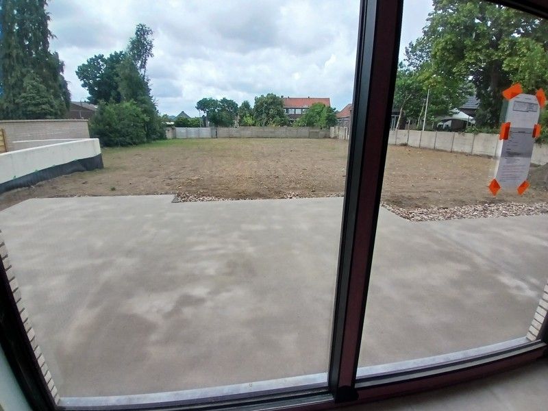 Gelijkvloers nieuwbouw appartement met terras en tuin gelegen in het centrum van Opglabbeek foto 4