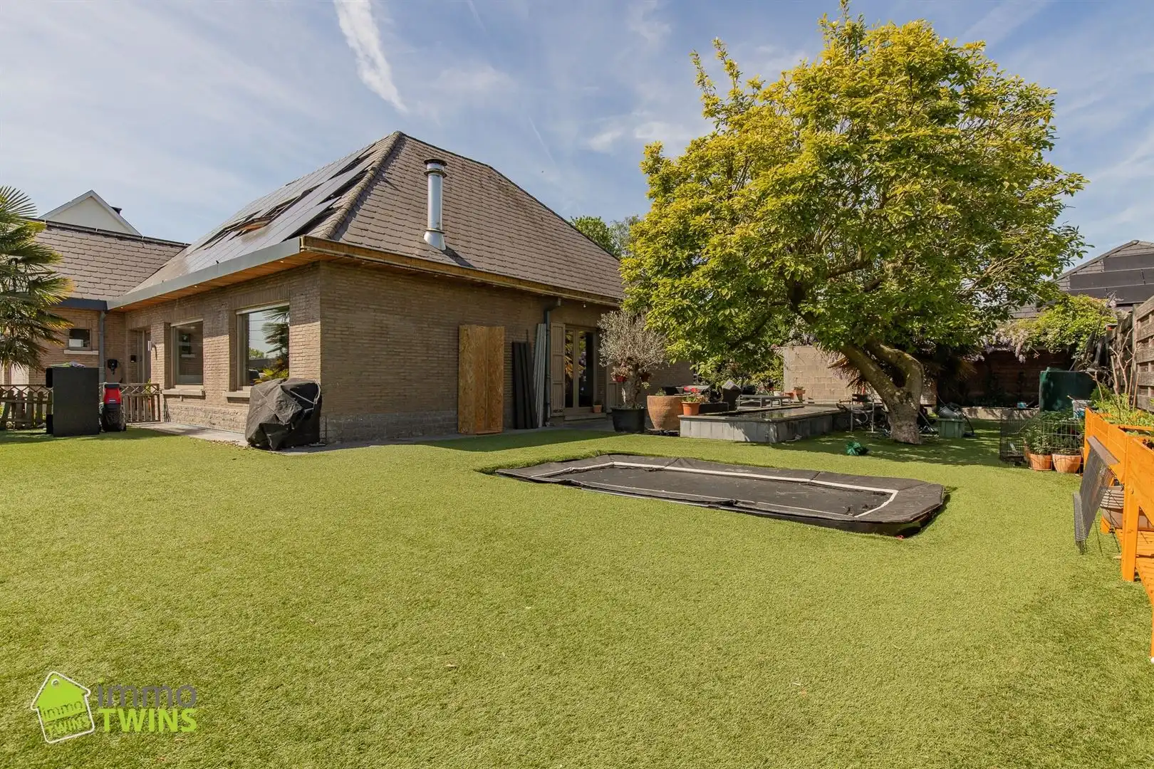 Ruime en energiezuinige OB met garage, tuin en oprit te Buggenhout. foto 5