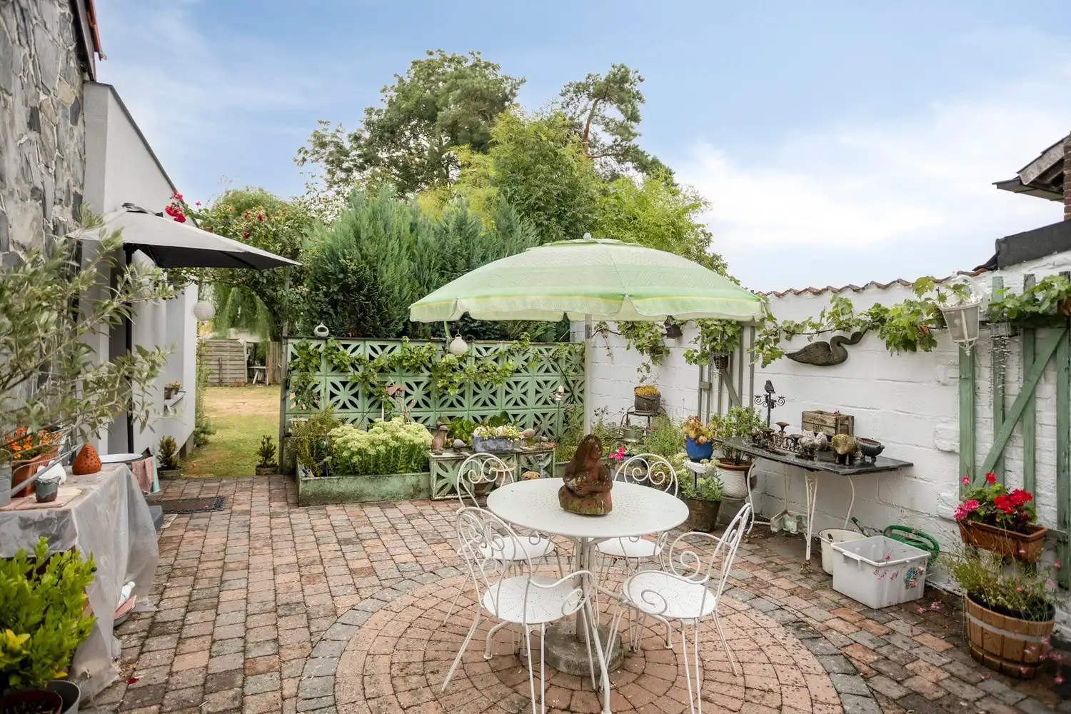 Charmante woning met tuin foto 24