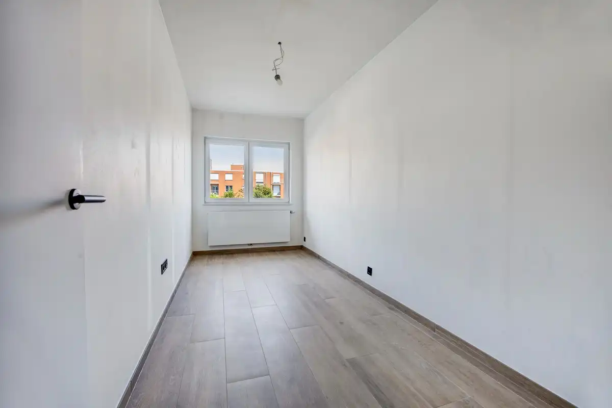 Luxueus, volledig gerenoveerd appartement met 3 slaapkamers, autostaanplaats en kelder foto 10