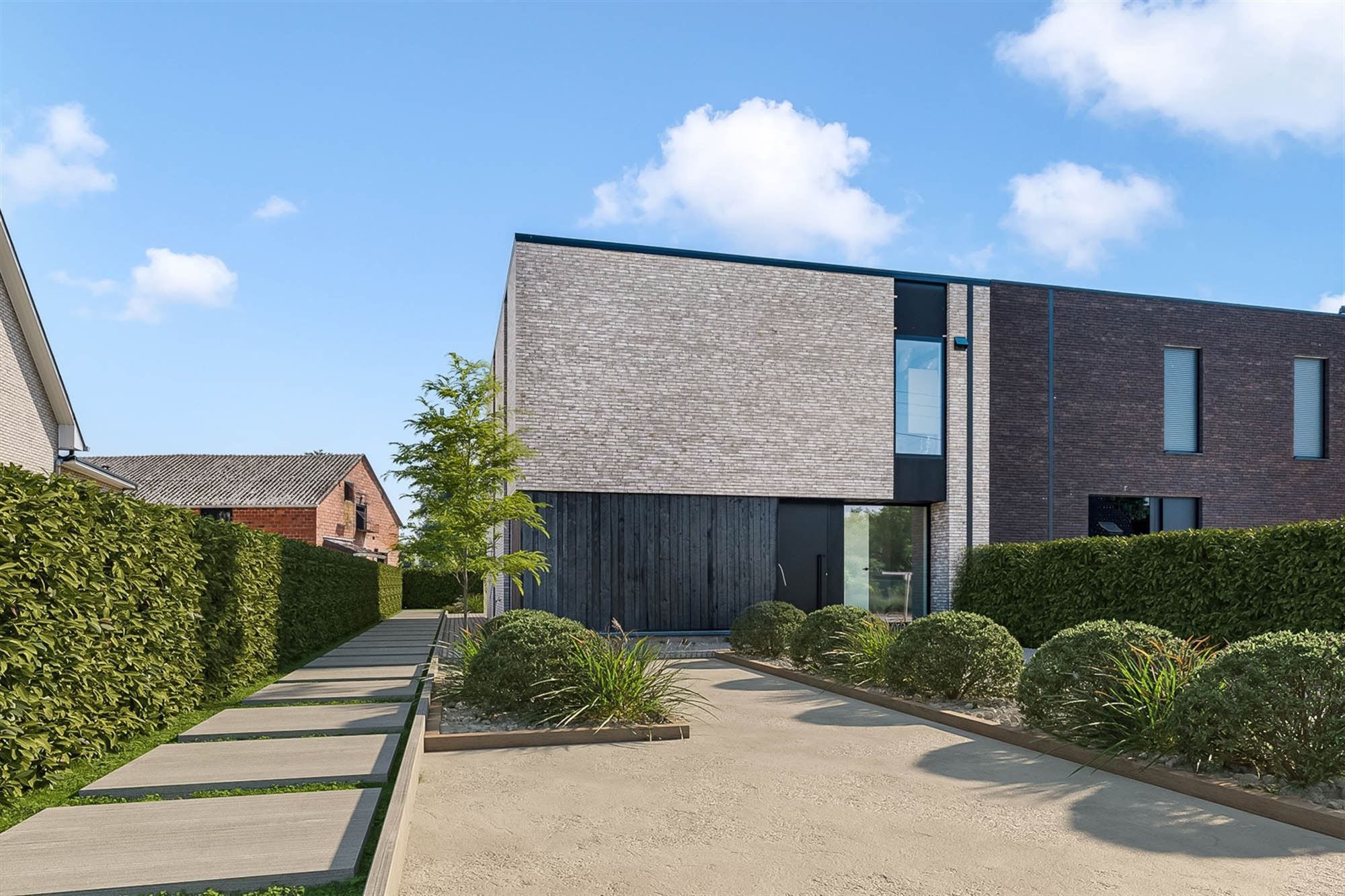 VOLLEDIG AFGEWERKTE NIEUWBOUWWONING (200M²) MET 3 SLAAPKAMERS EN E-PEIL 20! foto 3