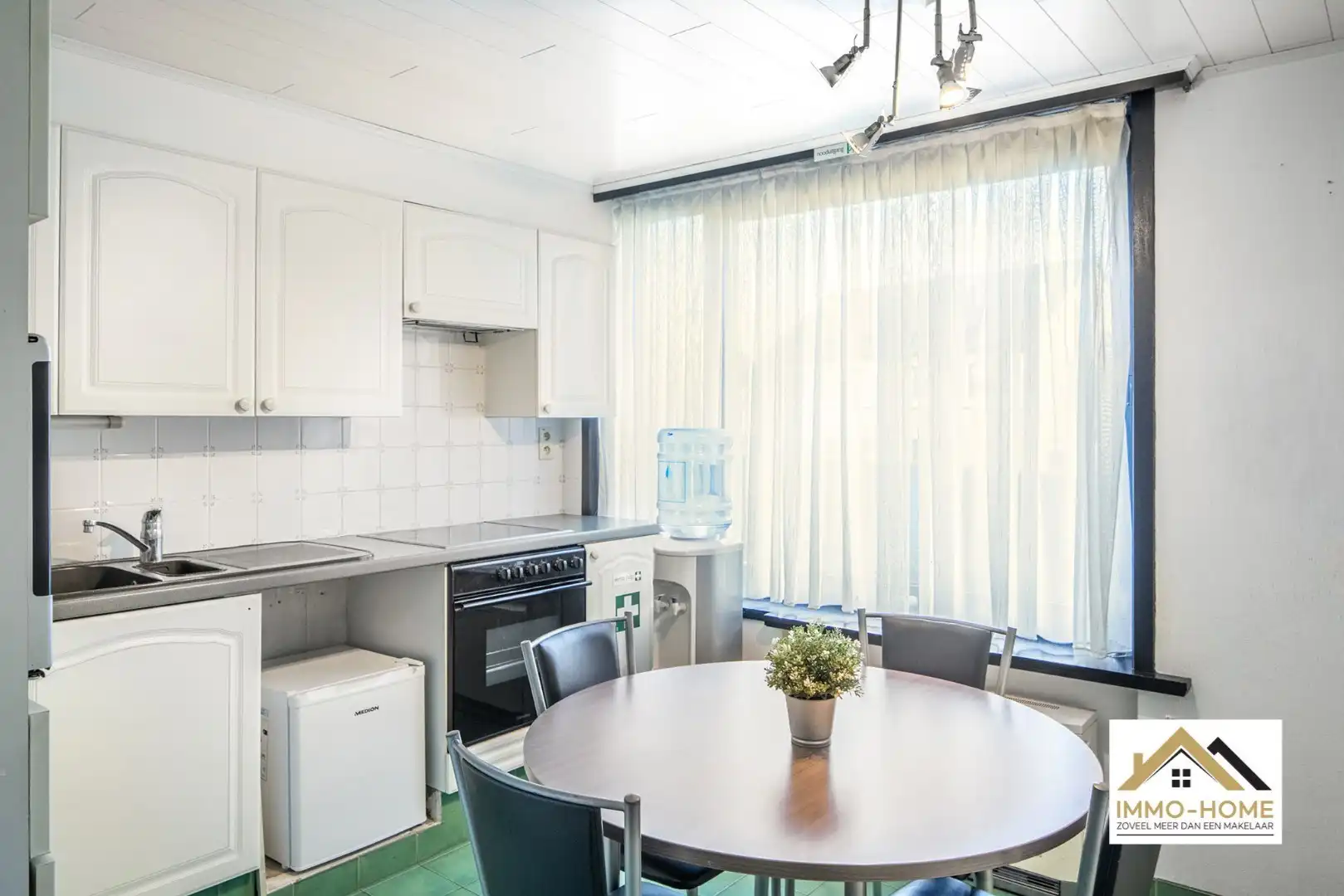 Zeer ruim gelijkvloers appartement met woonkelder en private tuin  foto 11