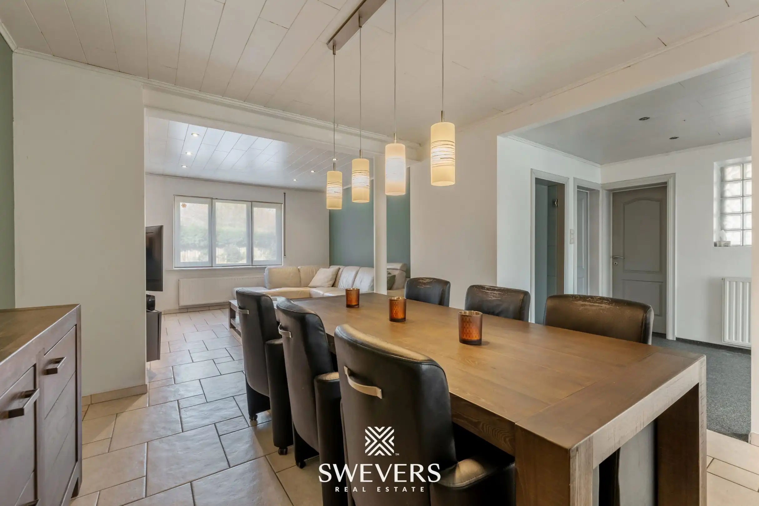 Ruime halfopen woning met zuidoostgerichte tuin en zwembad foto 10