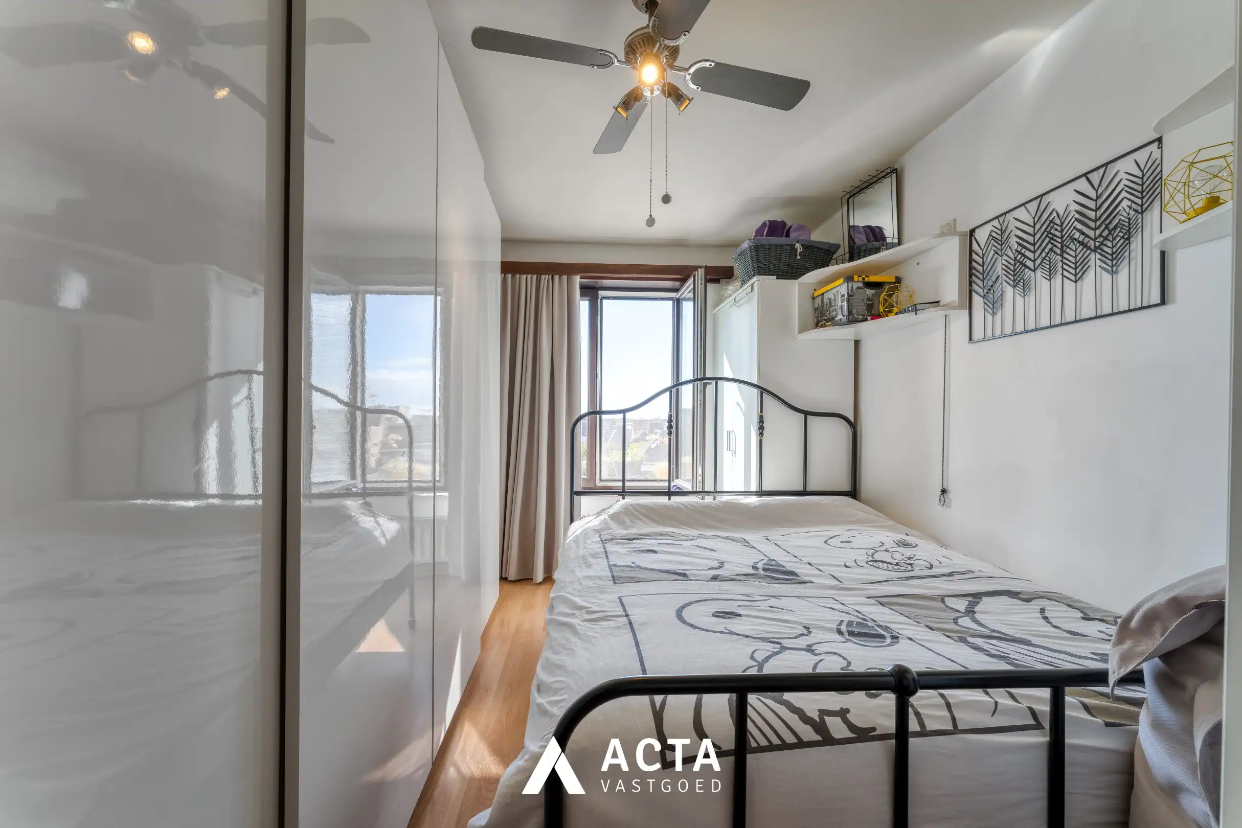 Dakappartement met zonnige terrassen in Mariakerke foto 9