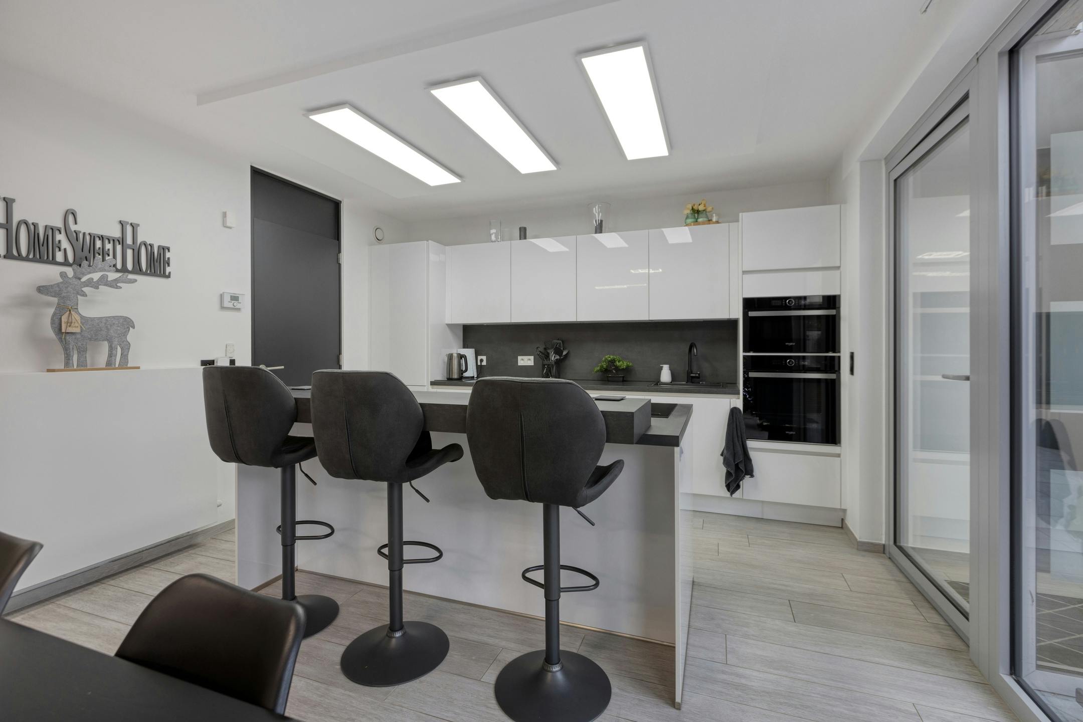 Energiezuinige woning met tuintje te koop in Maasmechelen foto 3