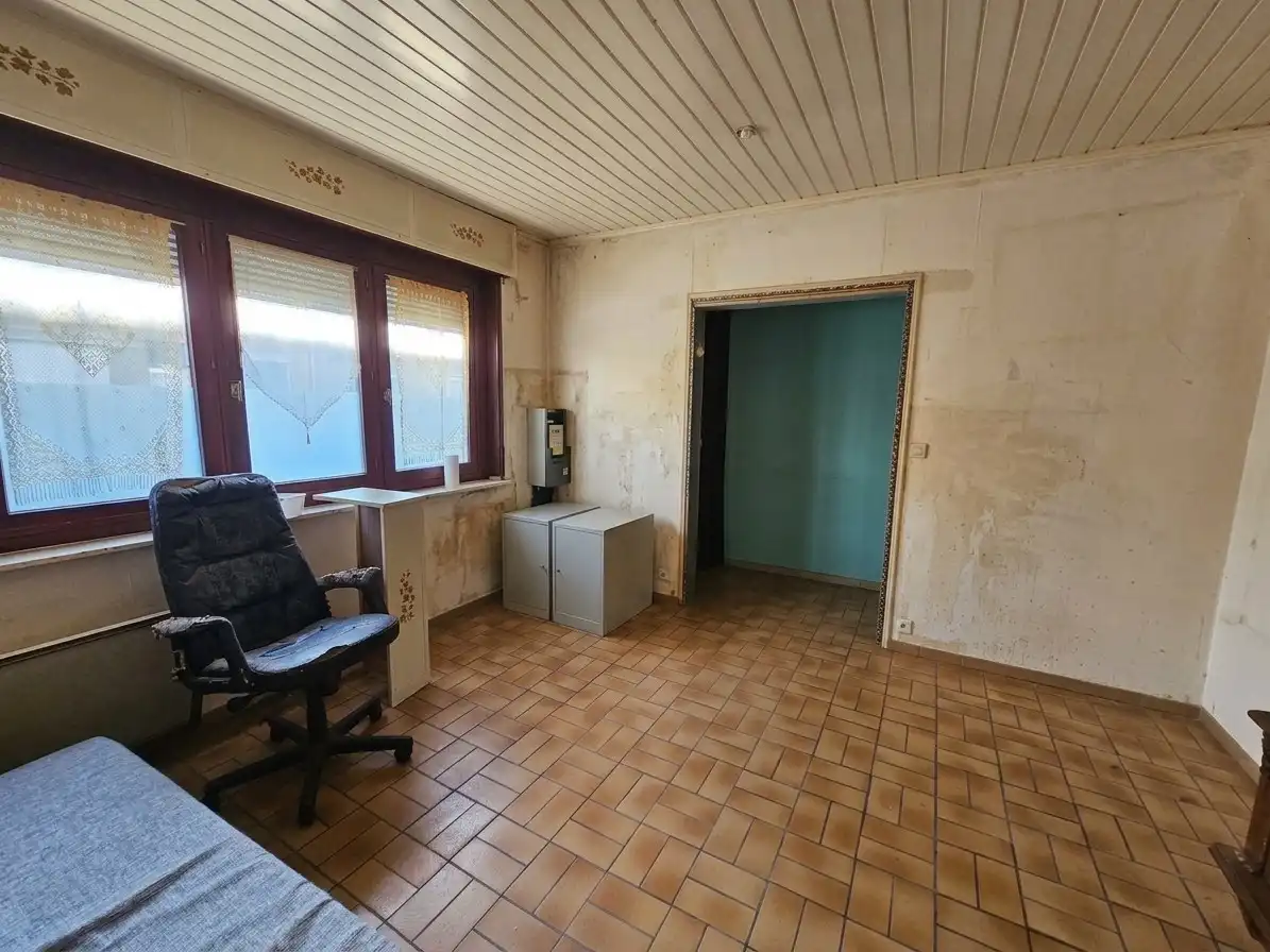 Te renoveren rijwoning op topligging! foto 3