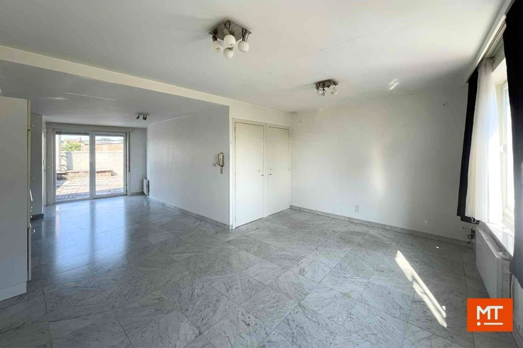 Veelzijdig gebouw bestaande uit handelsruimte, woning en appartement in het centrum van Wervik foto 19