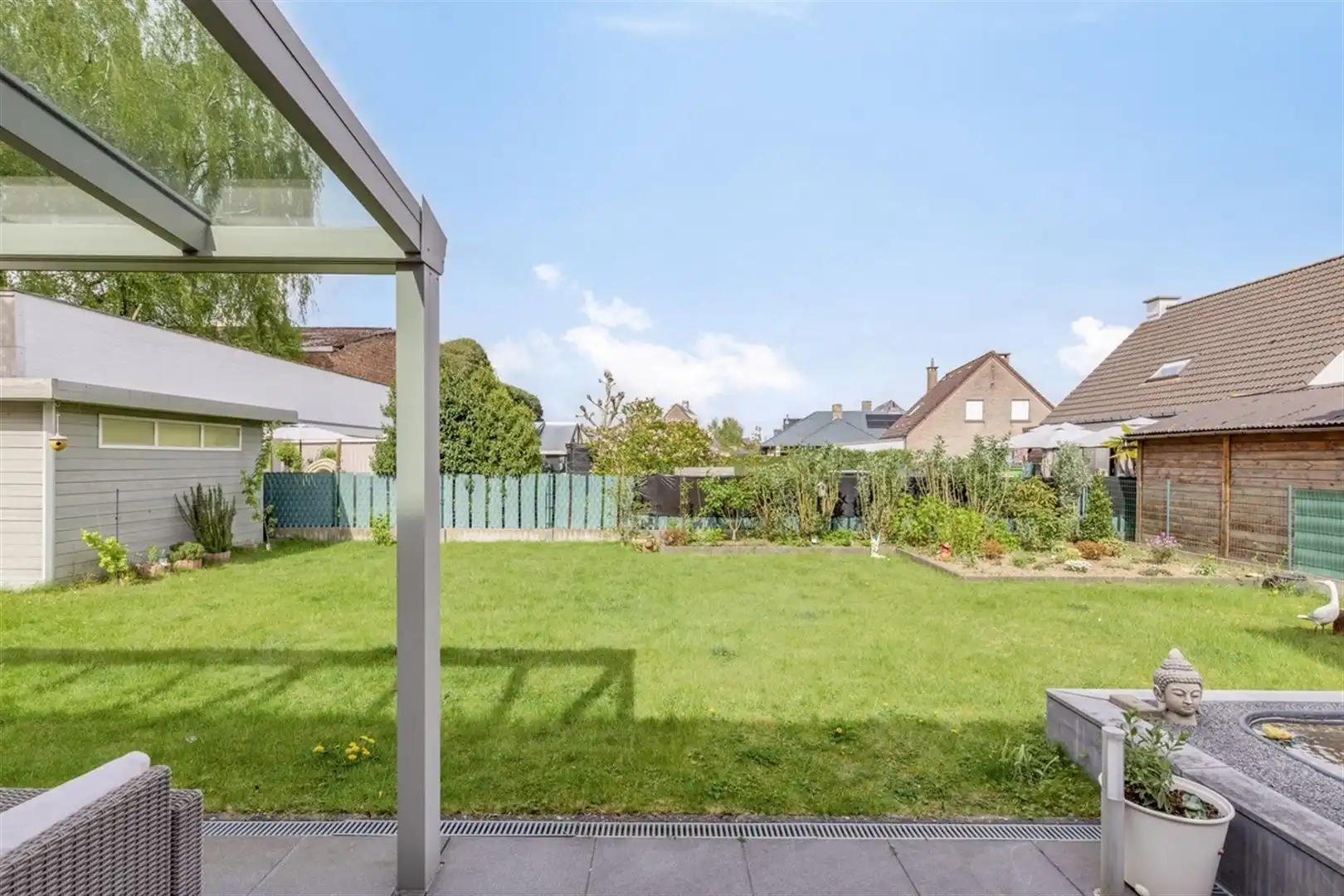 Verzorgde woning met 3 slpk en garage foto 32