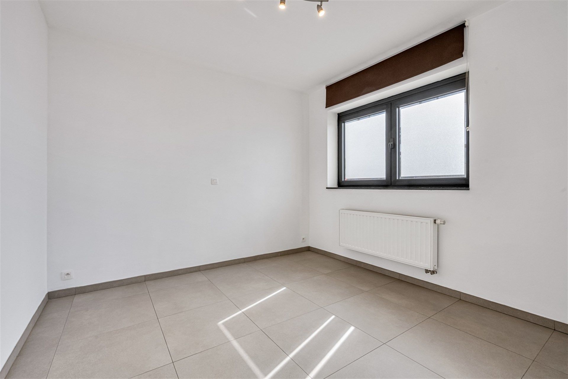 Instapklaar gelijkvloers appartement met zonnig terras foto 7