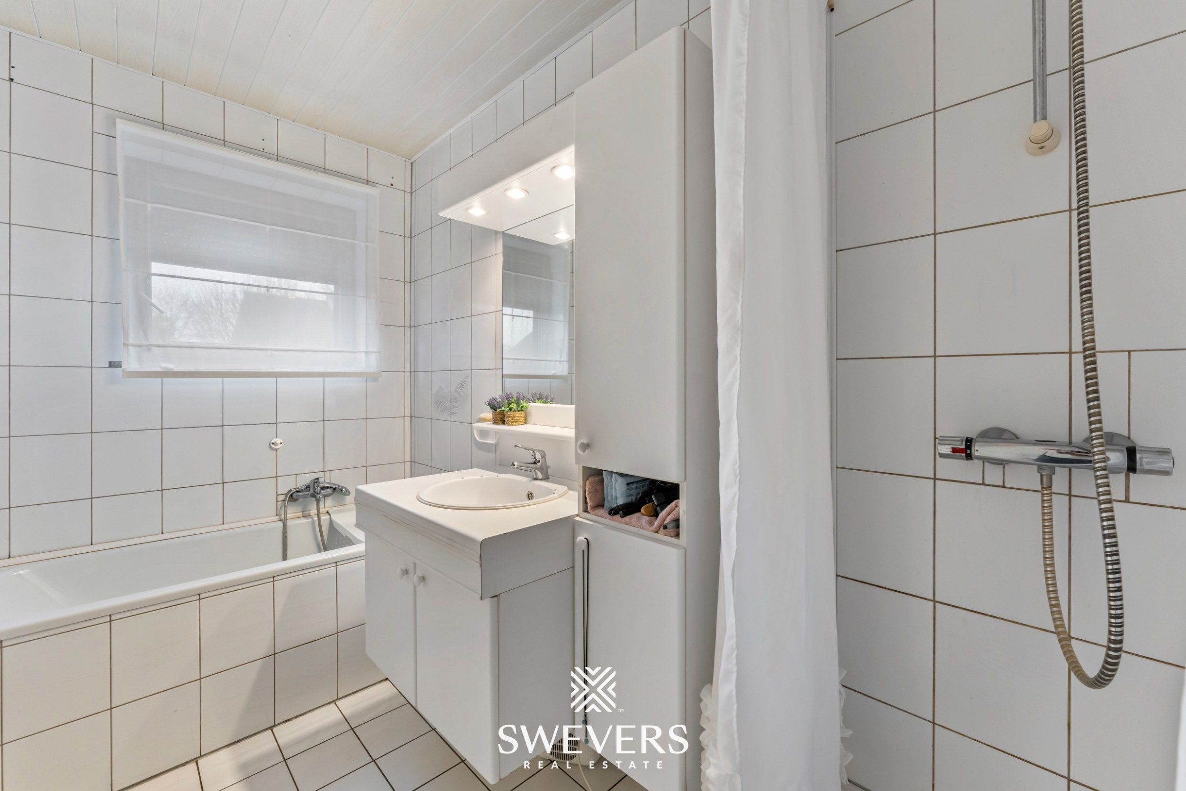 Instapklare open bebouwing met zuidgerichte tuin nabij het centrum van Heusden foto 18