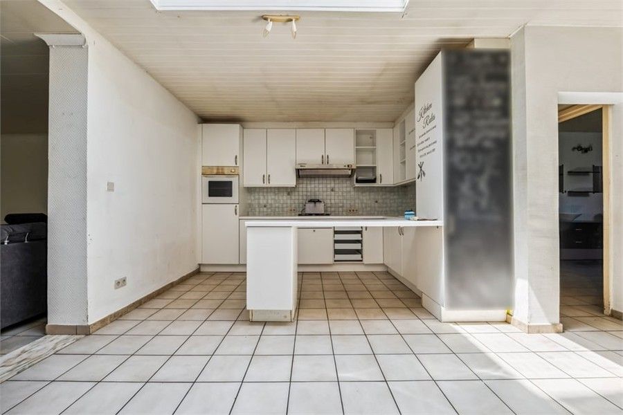 KNUSSE GEZINSWONING MET GEZELLIGE STADSTUIN IN HASSELT foto 11