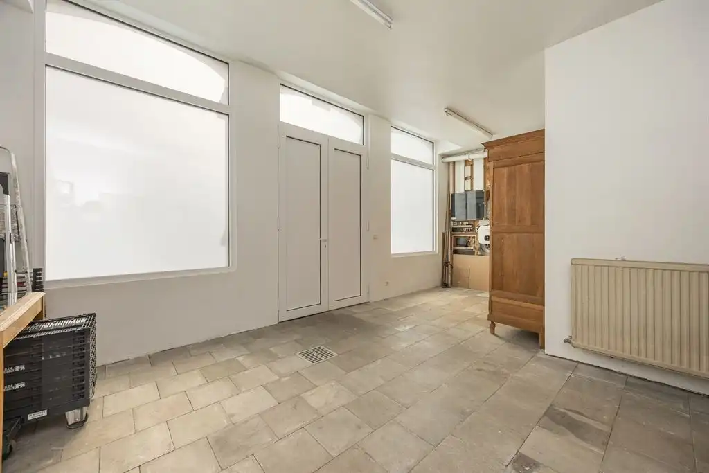 Unieke woning met eclectische gevels en dakterras foto 28