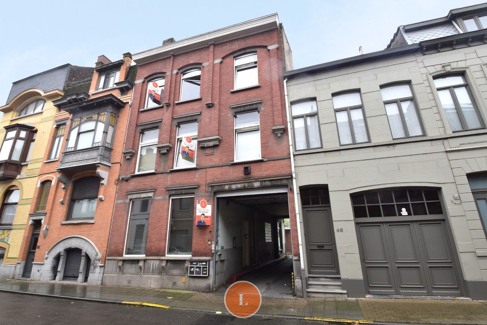 Opbrengsteigendom met 3 appartementen in Menen foto {{pictureIndex}}