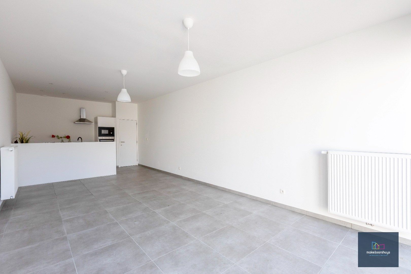 Instapklare energiezuinige woning met 3slpk tuin en staanplaats foto 7