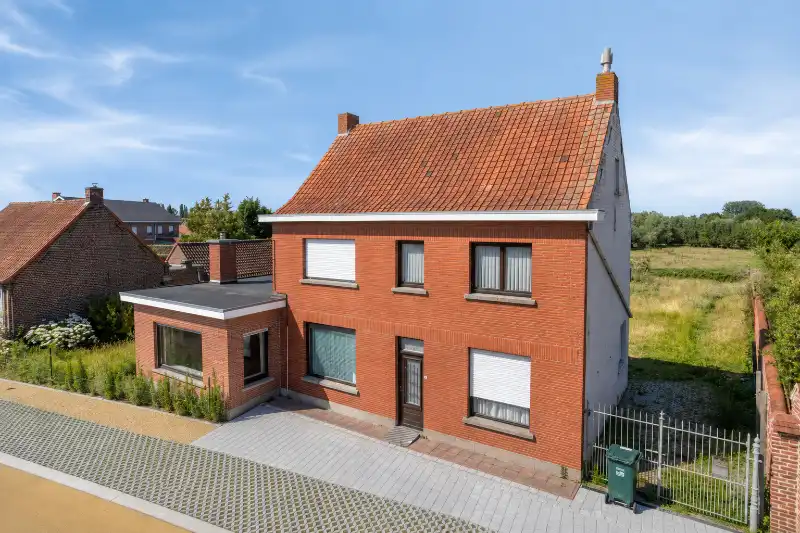 Hoofdfoto van de publicatie: Karaktervolle woning met voormalige schuur en adembenemend uitzicht op de velden