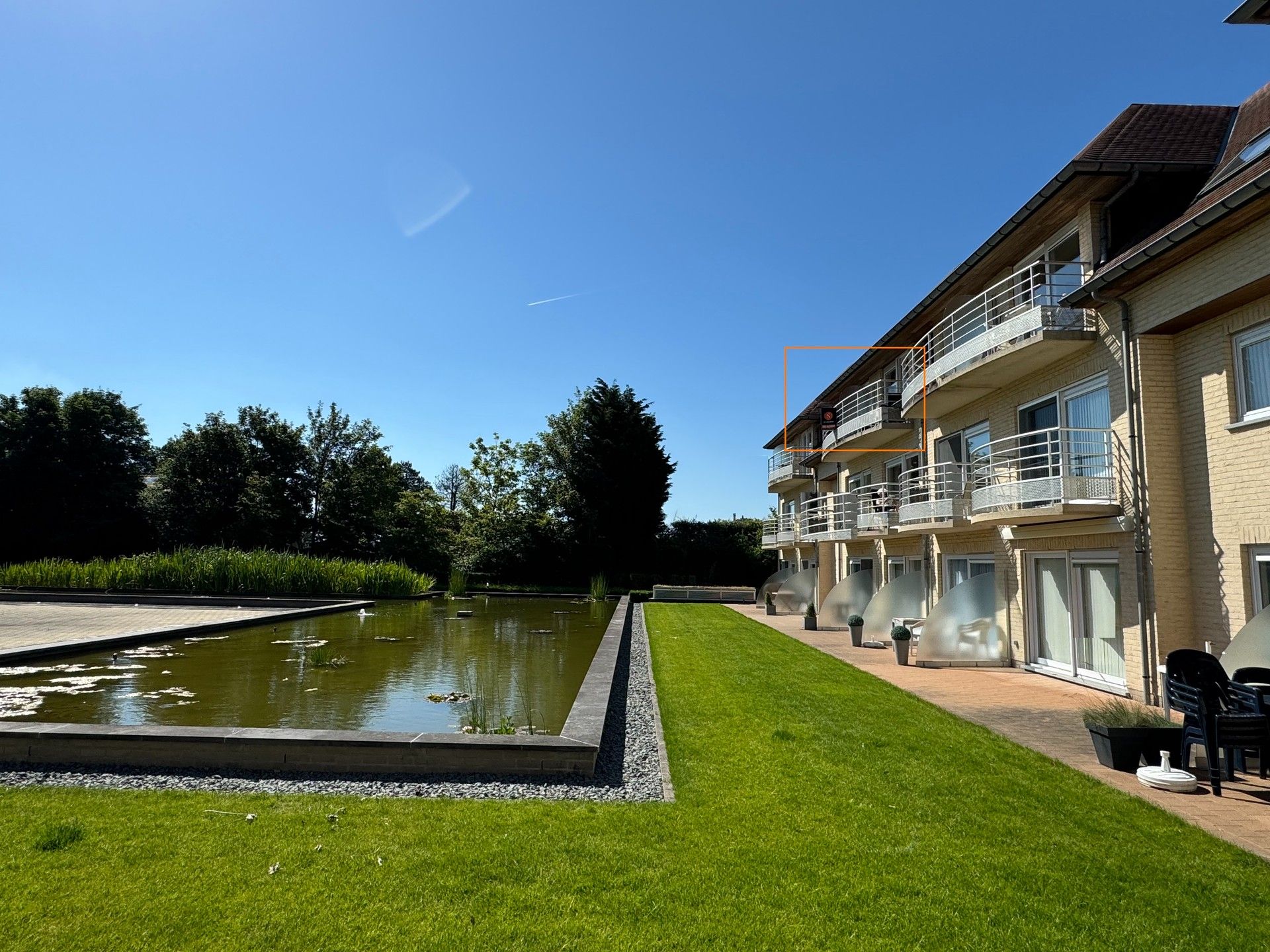 Modern & comfortabel appartement met terras, zwembad én vijverzicht aan het bos van De Haan te koop. foto 10