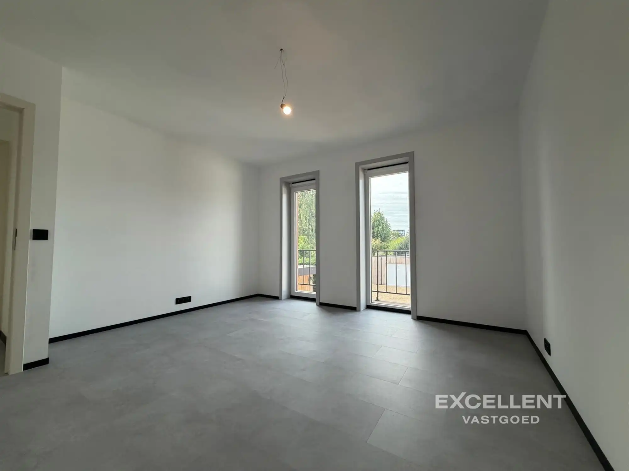 Ruim gerenoveerd 2-slaapkamer appartement te huur in Deinze foto 7
