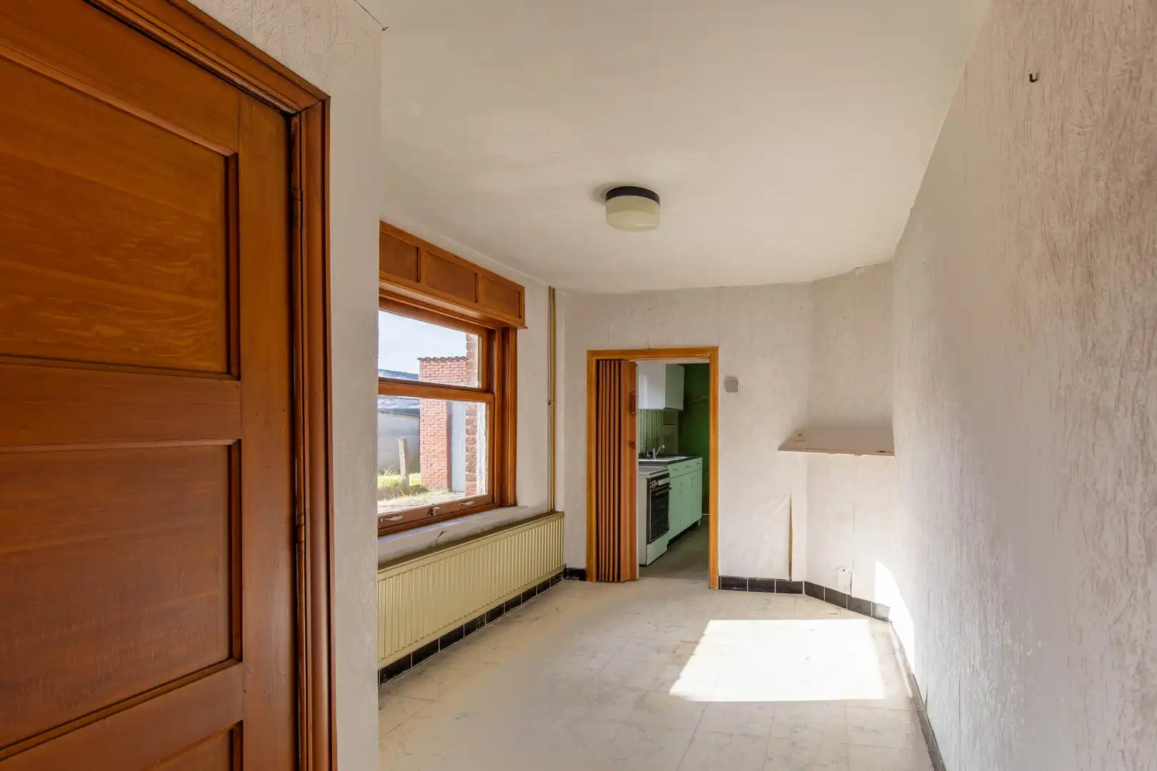 Renovatiewoning met grote garage foto 10