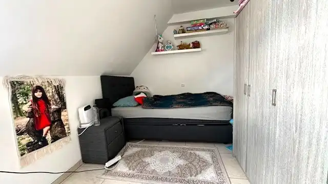 Centrum gelegen app. met 2 slpkms en garage foto 13