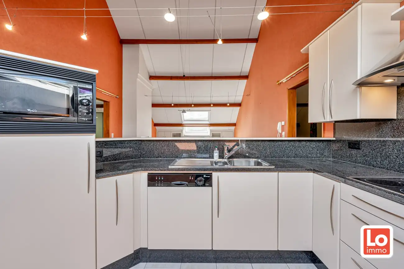 Degelijke open (kangoeroe)woning met inpandige garage en gezellige zuidwest georiënteerde tuin op een rustige locatie nabij het centrum van Lochristi! foto 25