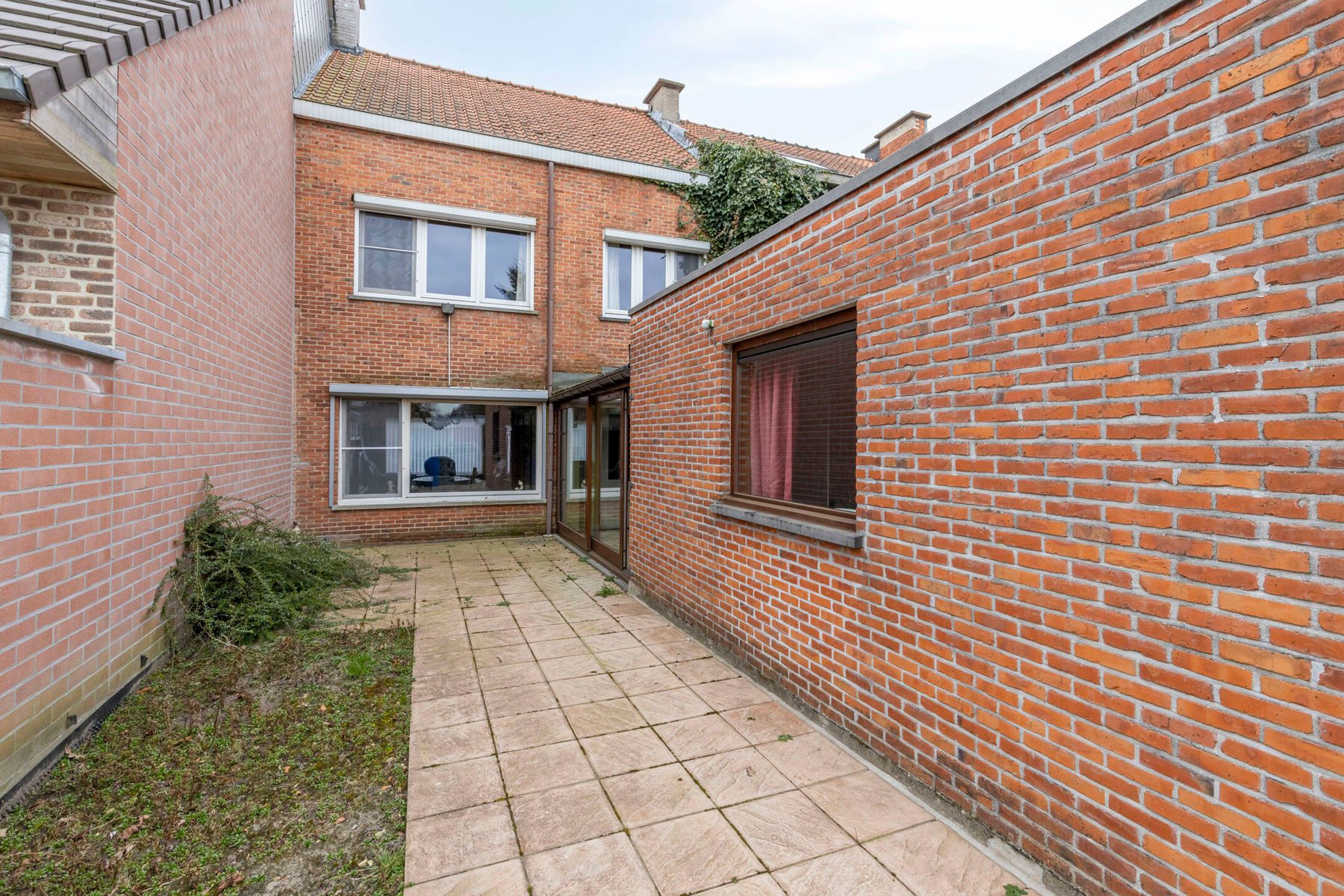 Ruime woning met tuin én garage in hartje Belsele foto 17