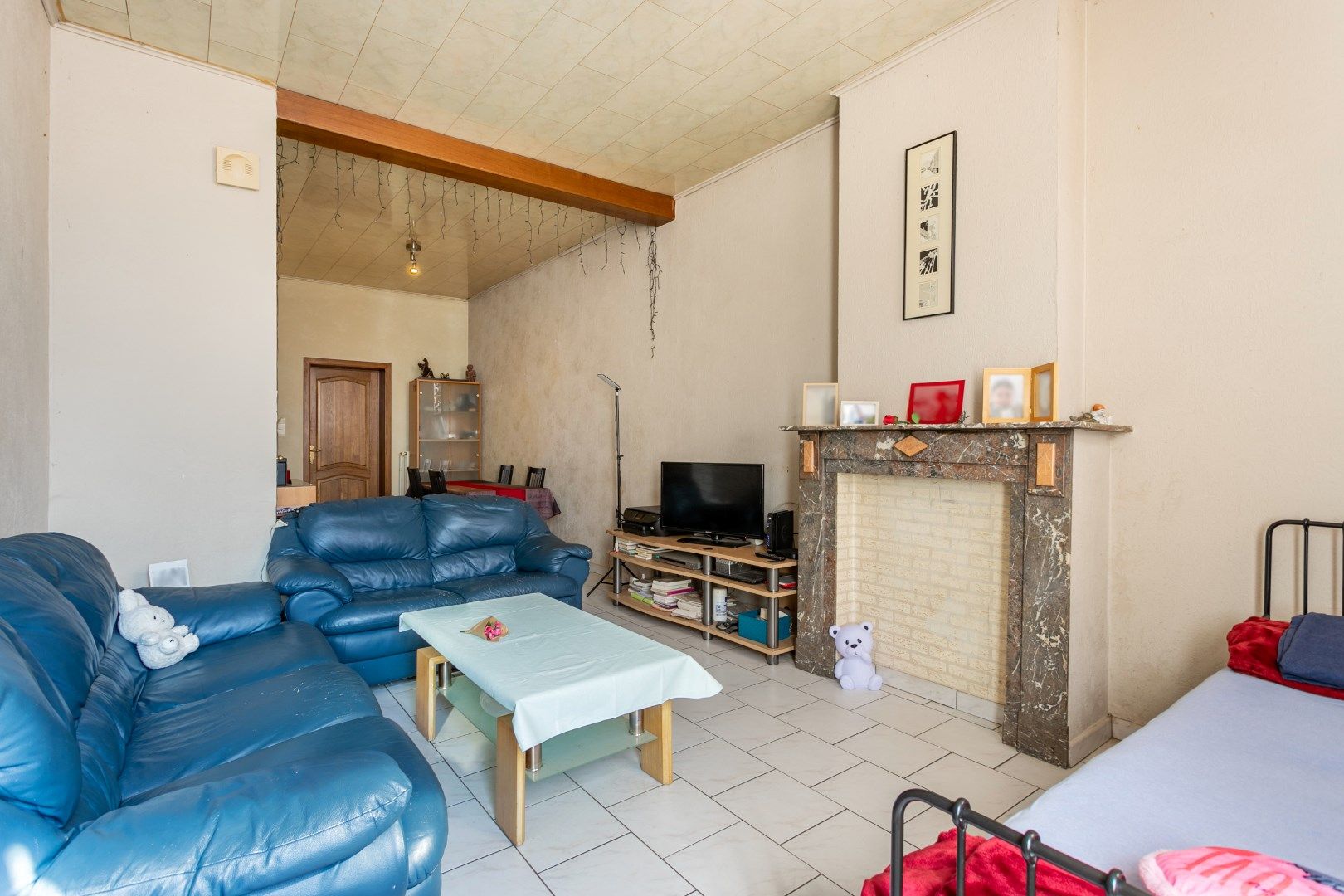 Op te frissen woning met 2 à 3 slpk en tuin te Buizingen. foto 3