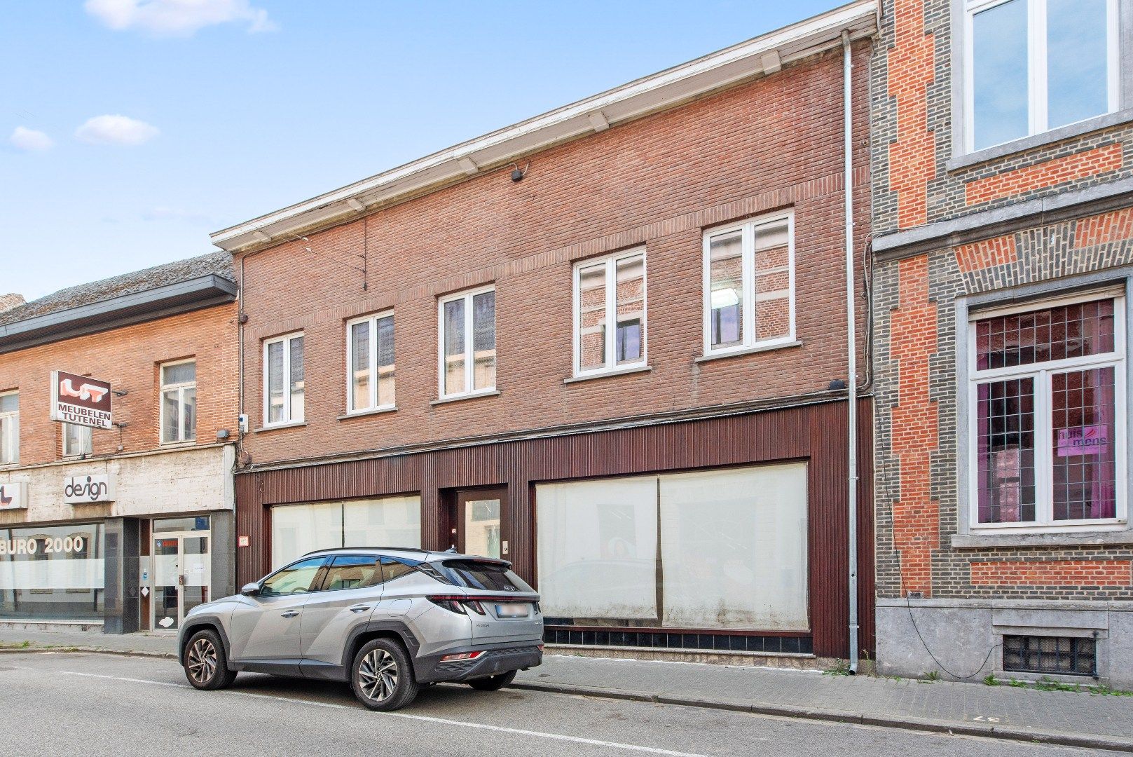 Polyvalente rijwoning met grote handelsruimte te Tienen foto 6