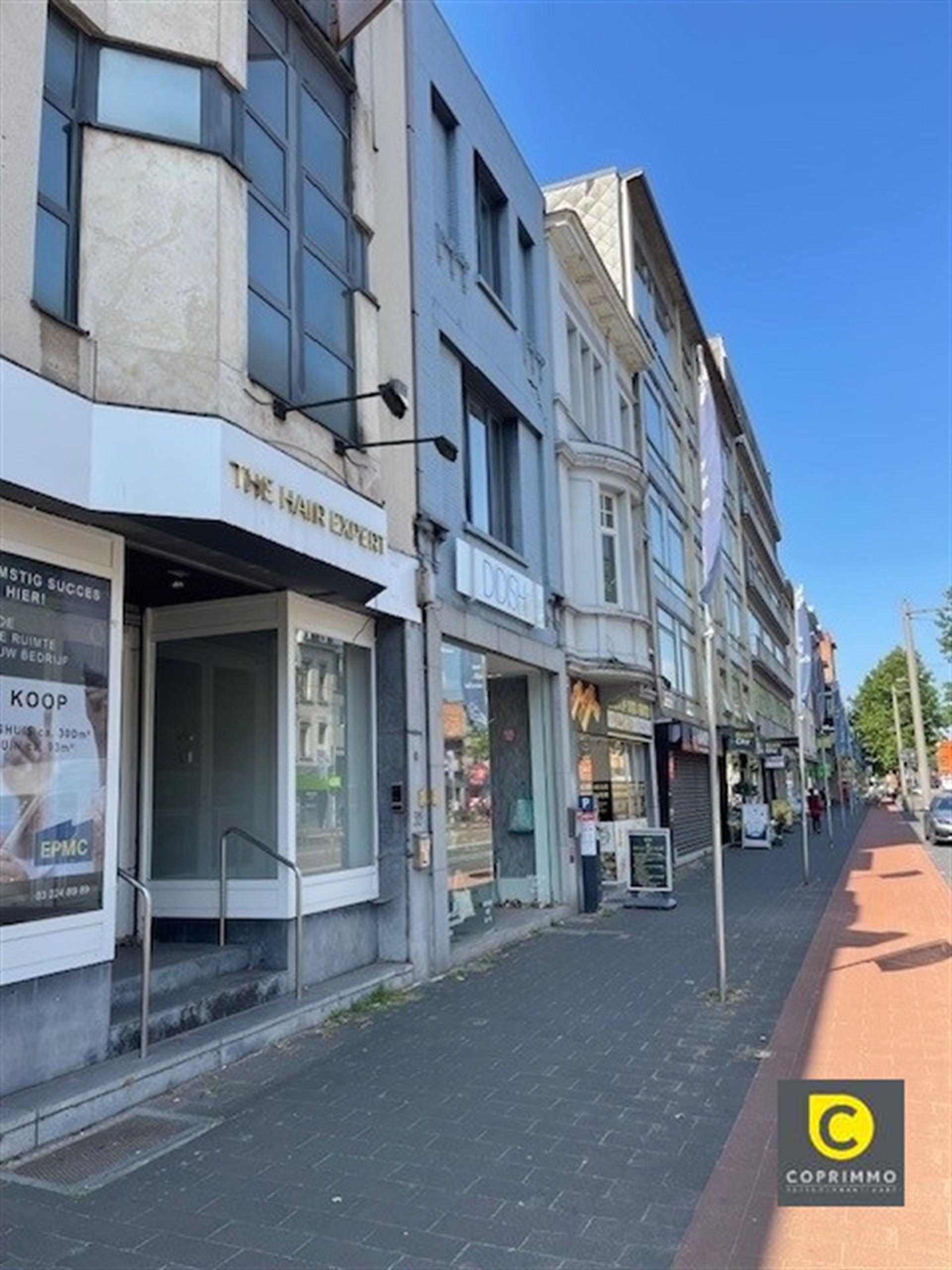 Opbrengsteigendom met 2 app en handelsruimte foto 9