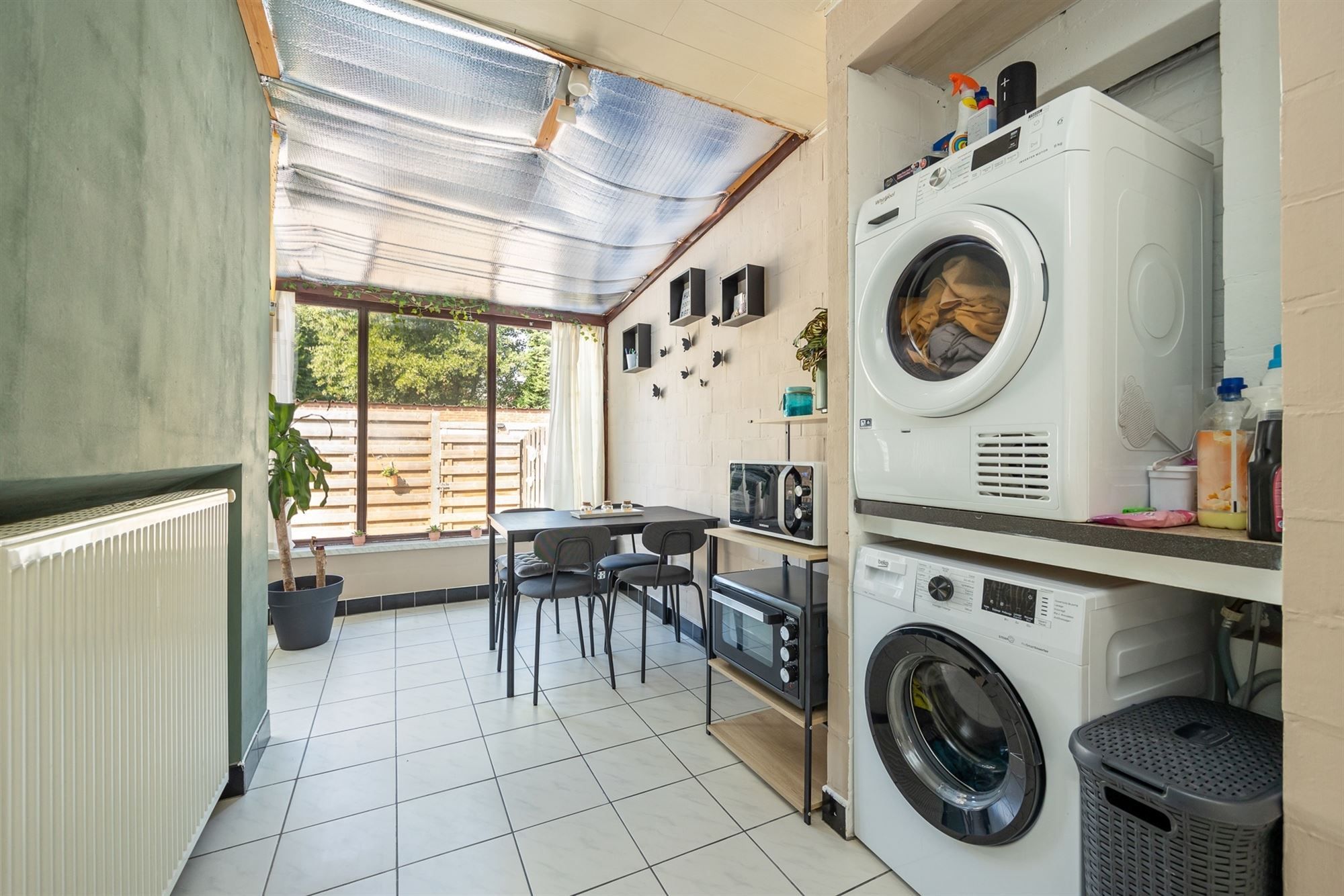 Gelijkvloersappartement met stadskoer en garagebox foto 17