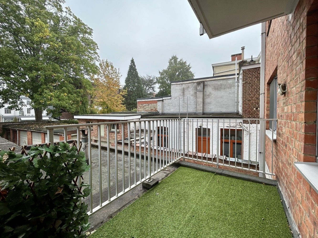 Instapklaar 3-slaapkamerappartement met terras in hartje Leuven foto 12