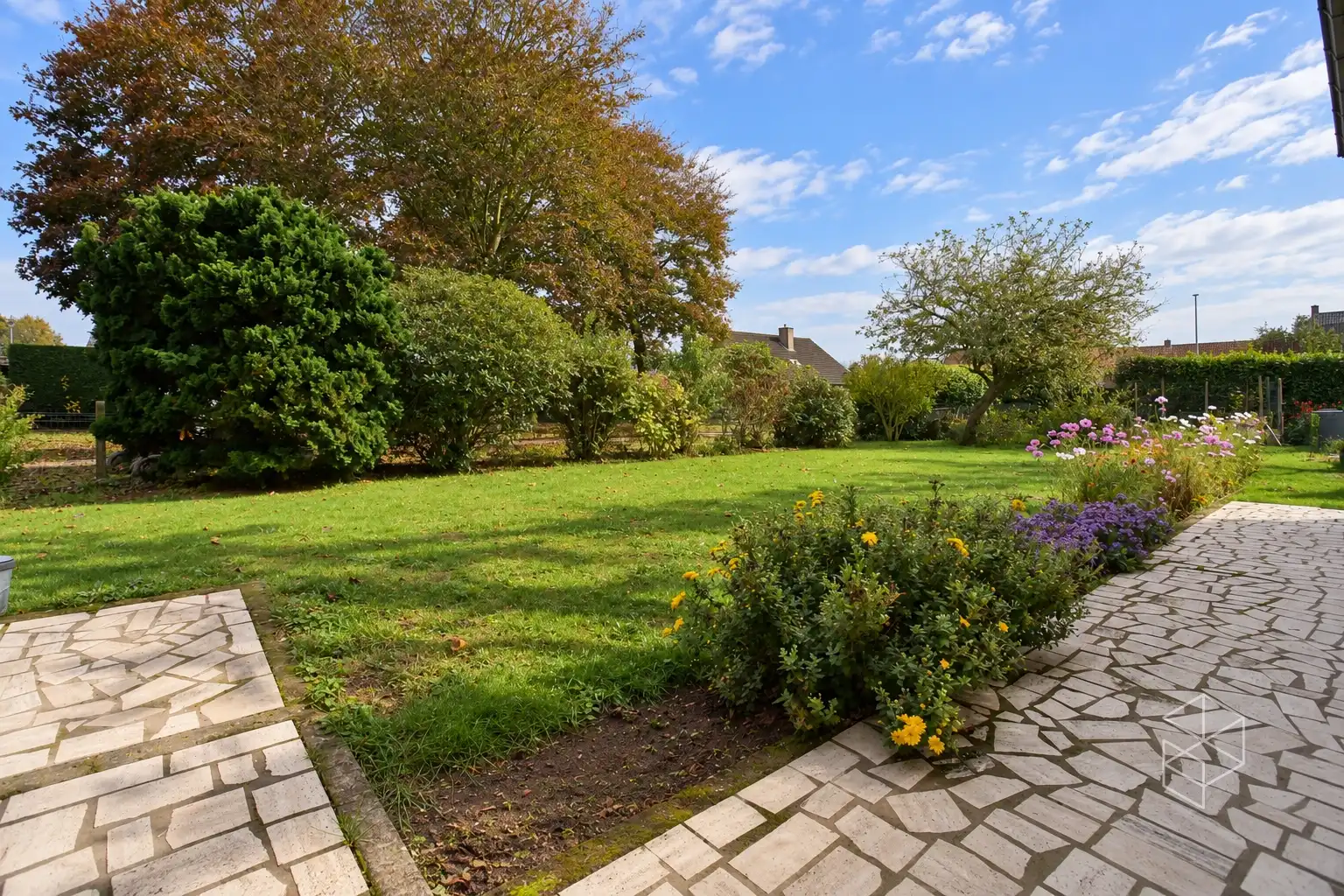 Zeer goed onderhouden gezinswoning met 4 slaapkamers en zonnige tuin foto 4