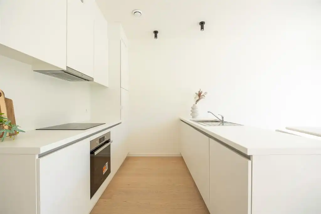 Nieuwbouw gelijkvloersappartement met tuin foto 4